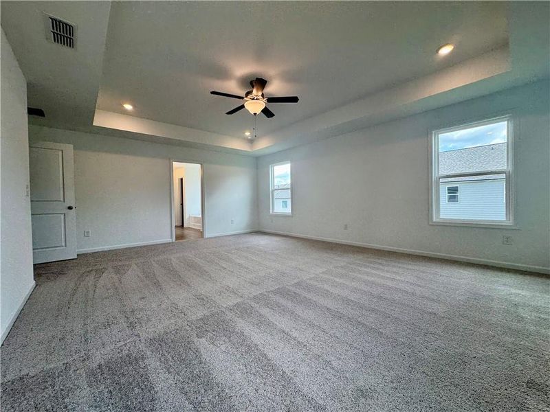 Spacious, unfurnished interior of a new home in Eastlyn Crossing - Single Family, Flowery Branch (Image 33). Spacious, unfurnished interior of a new home in Eastlyn Crossing - Single Family, Flowery Branch (Image 33).