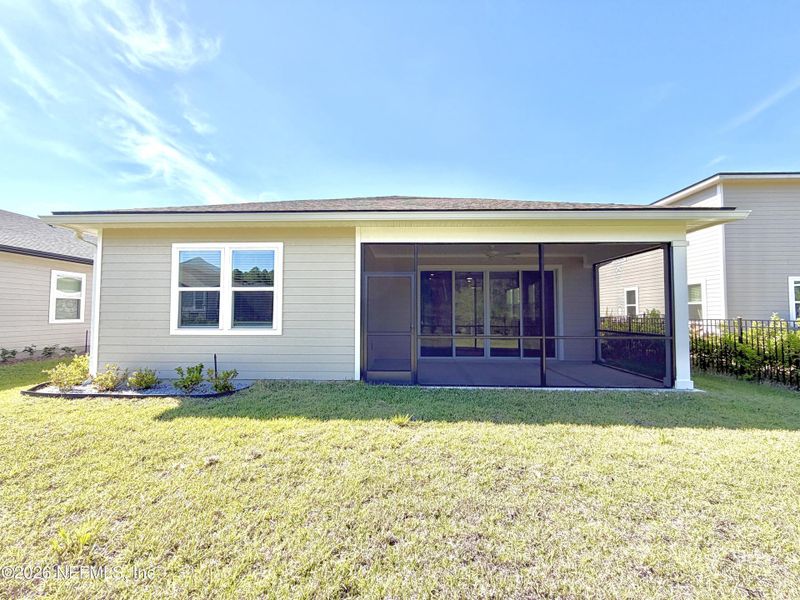 Exterior details and patio area of a home in Seasons at TrailMark, St. Augustine (Image 3).