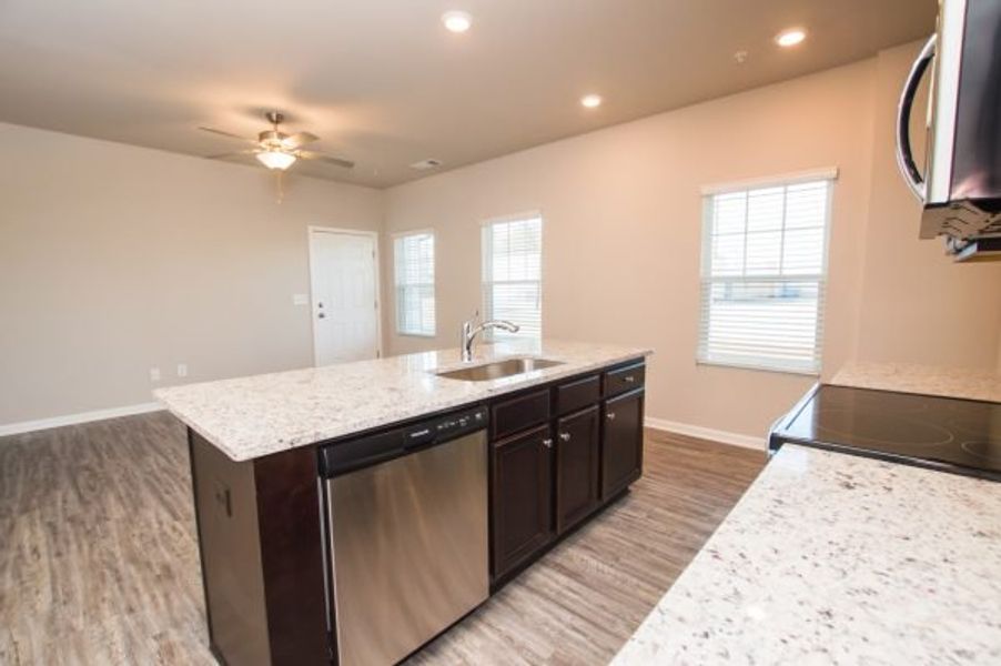 Representative furnished interior of a home built from the Cadence Unit A by Piedmont Residential in Ross Pointe, Kennesaw (Image 6).