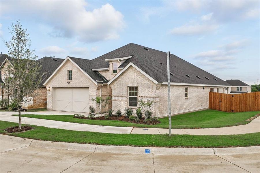 View of front of house featuring a shingled roof, brick siding, concrete driveway, and an attached garage View of front of house featuring a shingled roof, brick siding, concrete driveway, and an attached garage