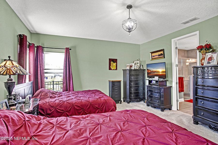 Furnished interior view inside a new home in Tributary: Lakeview at Tributary 60's, Yulee (Image 14).