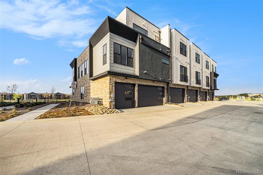 Front exterior of a new home in Montmere at Autrey Shores, Superior, CO, highlighting curb appeal (Image 23).
