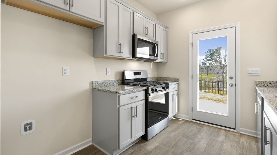 Furnished interior view inside a new home in Henley Ridge, Graham (Image 5).