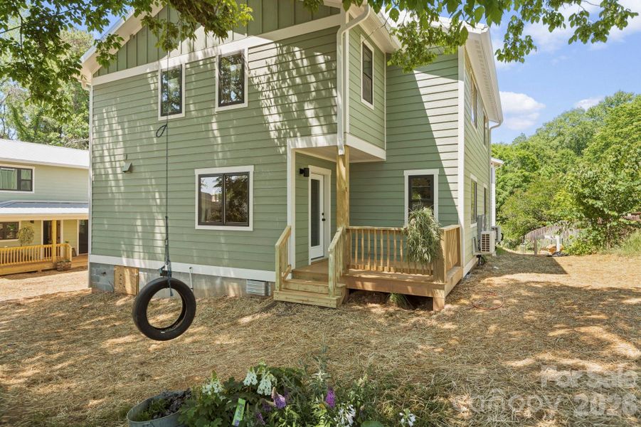 Shade trees and tire swing = fun Shade trees and tire swing = fun