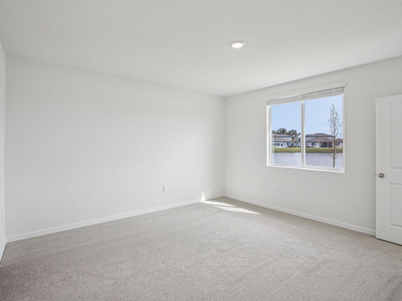 Spacious, unfurnished interior of a new home in Two Rivers - Classic Series, Zephyrhills (Image 12).