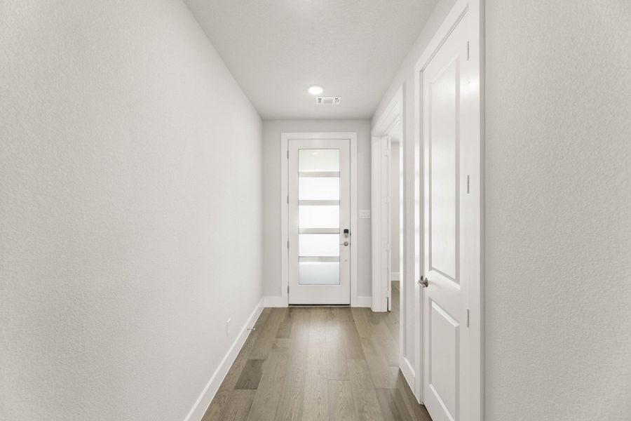 Representative unfurnished interior of a home built from the Aspen by Tri Pointe Homes in Treeline, Justin (Image 11).