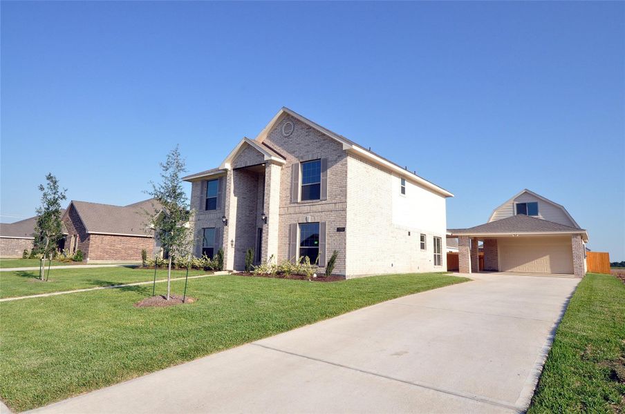 Front exterior of a new home in , League City, TX, highlighting curb appeal (Image 26).