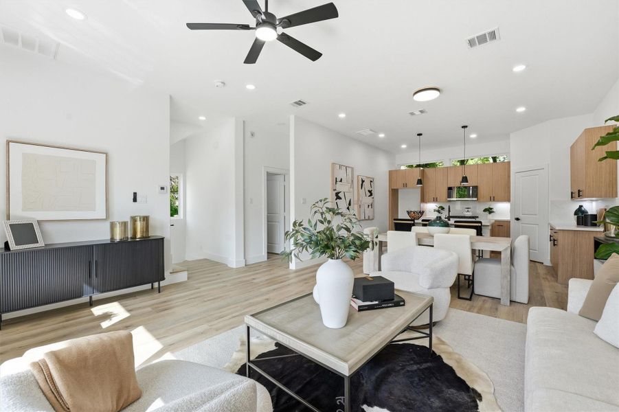 Spacious living and dining on the main level with upgraded LED lighting.