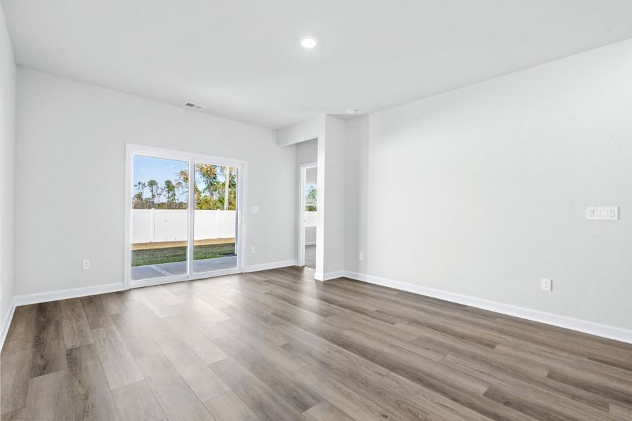 Spacious, unfurnished interior of a new home in Cypress Ridge - The Boardwalk Series, Longs (Image 14).