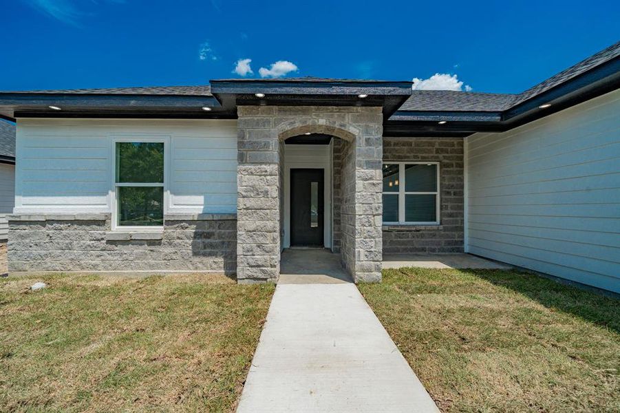 Front exterior of a new home in , Malakoff, TX, highlighting curb appeal (Image 20).