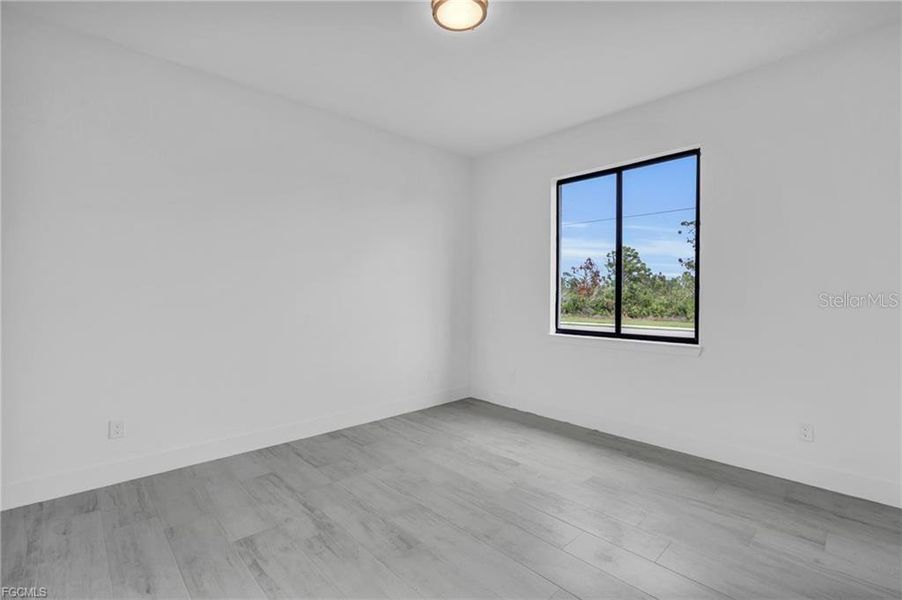 Spacious, unfurnished interior of a new home in , Port Charlotte (Image 31).
