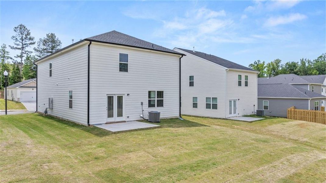 Exterior details and patio area of a home in Shoal Creek, Hampton (Image 3).