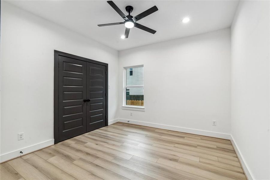 On the first floor this secondary bedroom offers a clean aesthetic and modern features, perfect for a flexible living space