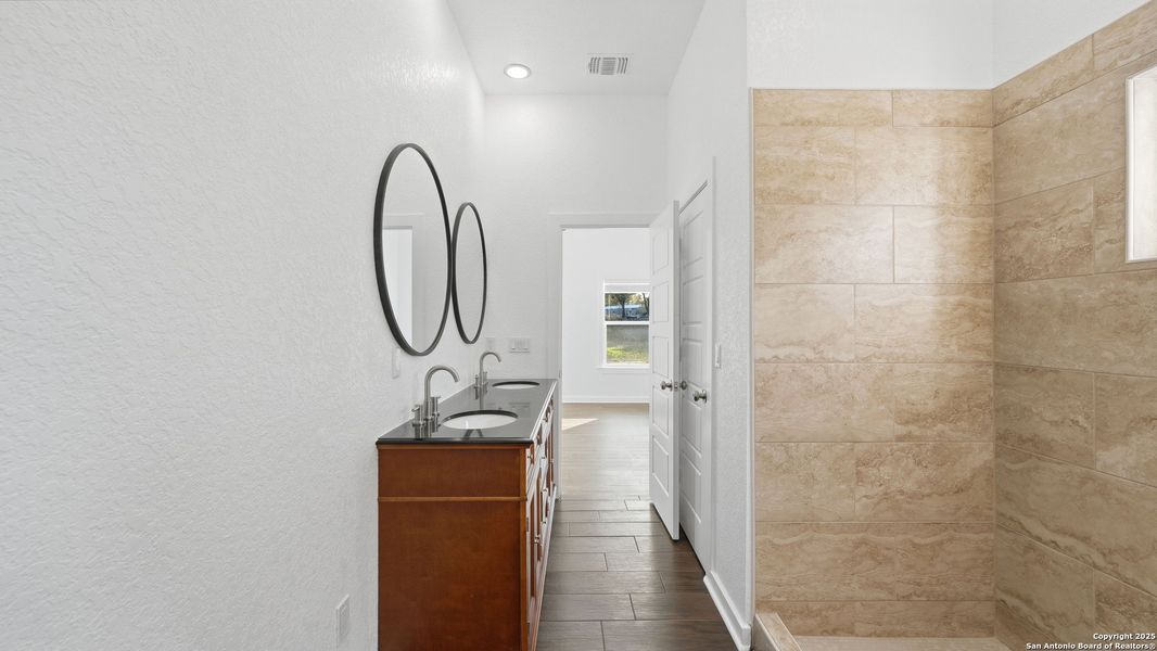 Furnished interior view inside a new home in , Elmendorf (Image 11).