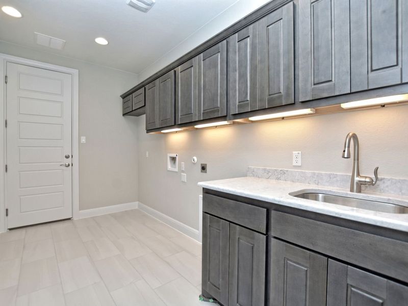 Representative furnished interior of a home built from the Madera II by Giddens Homes in Scofield Farms Estates, Georgetown (Image 189).