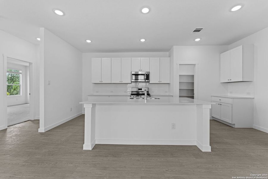 Furnished interior view inside a new home in Waterwheel: Coastline Collection, San Antonio (Image 5).