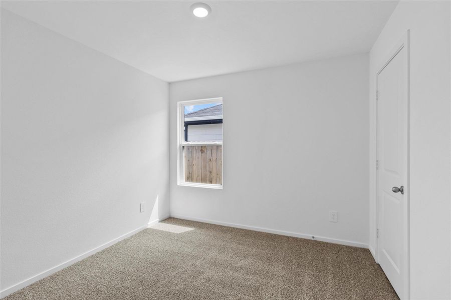 Spacious, unfurnished interior of a new home in The Canopies, Splendora (Image 21).