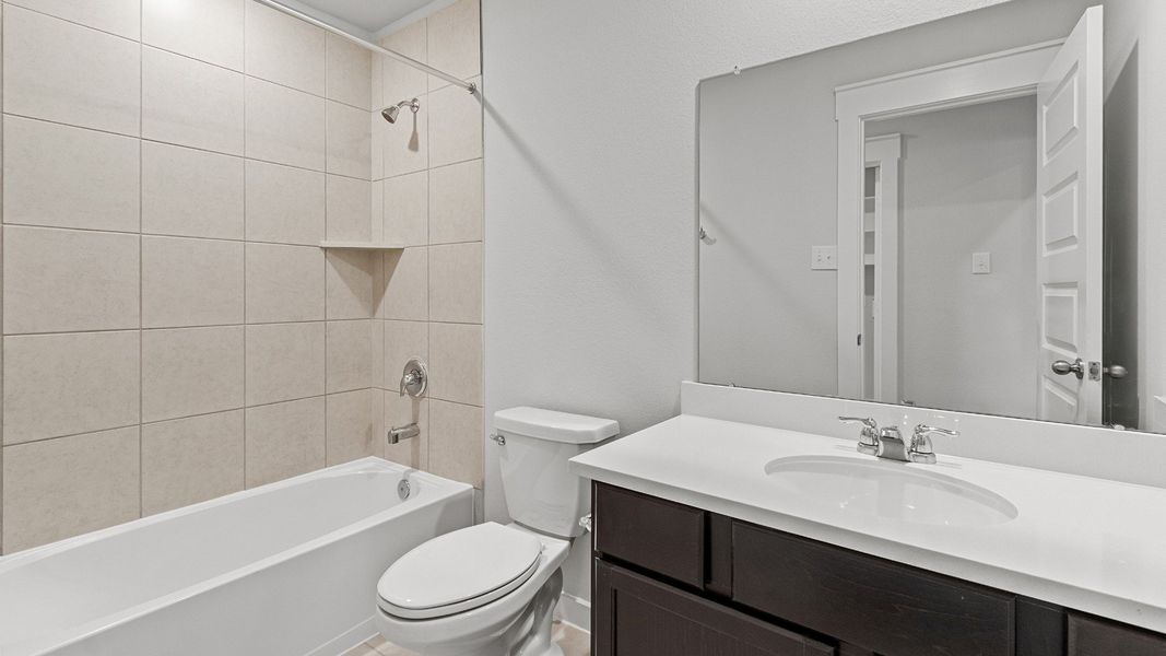 Representative furnished interior of a home built from the Kimbell by Brightland Homes in Sunterra, Katy (Image 15).