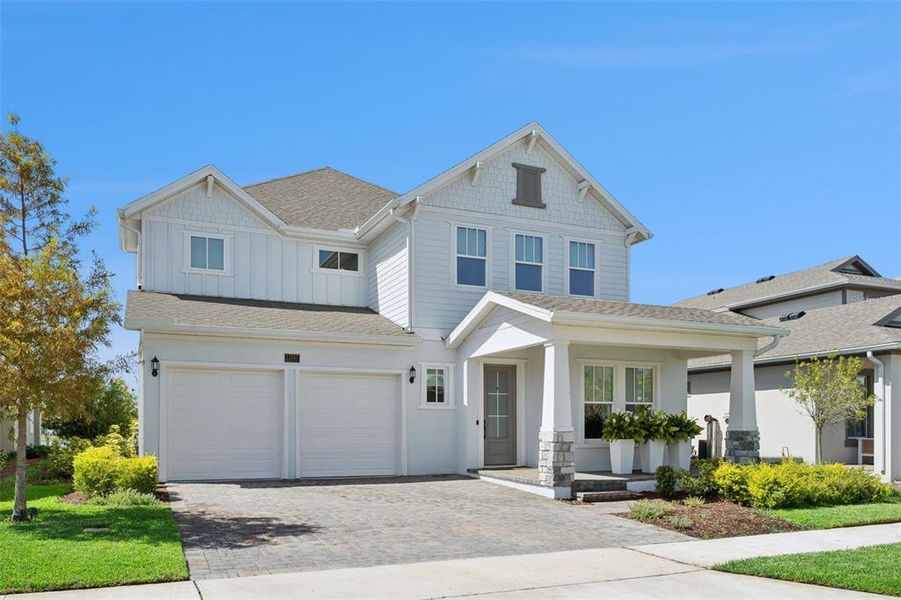Front exterior of a new home in , Orlando, FL, highlighting curb appeal (Image 2). Front exterior of a new home in , Orlando, FL, highlighting curb appeal (Image 2).