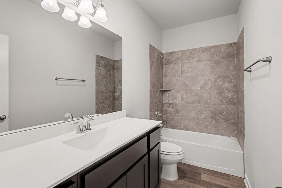 Furnished interior view inside a new home in Clear View Estates, Willis (Image 9).