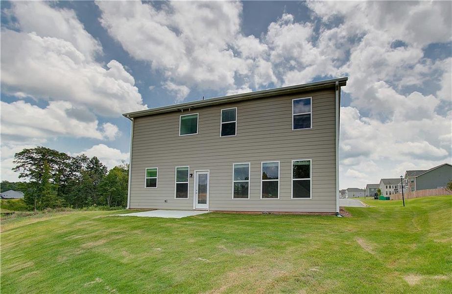 Front exterior of a new home in Chapel Hill, Newnan, GA, highlighting curb appeal (Image 16). Front exterior of a new home in Chapel Hill, Newnan, GA, highlighting curb appeal (Image 16).