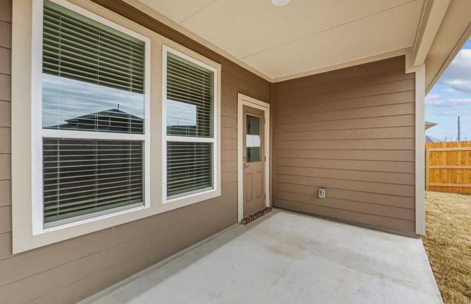 Exterior details and patio area of a home in Crosswinds, Kyle (Image 24).