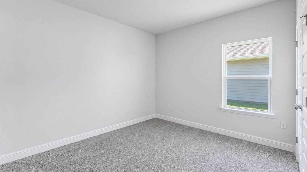 Representative unfurnished interior of a home built from the The Delray by D.R. Horton in Buffer Farms, Port Saint Joe (Image 13).