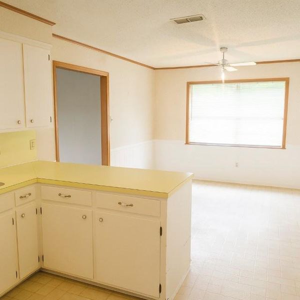 Furnished interior view inside a new home in , Mineola (Image 12).