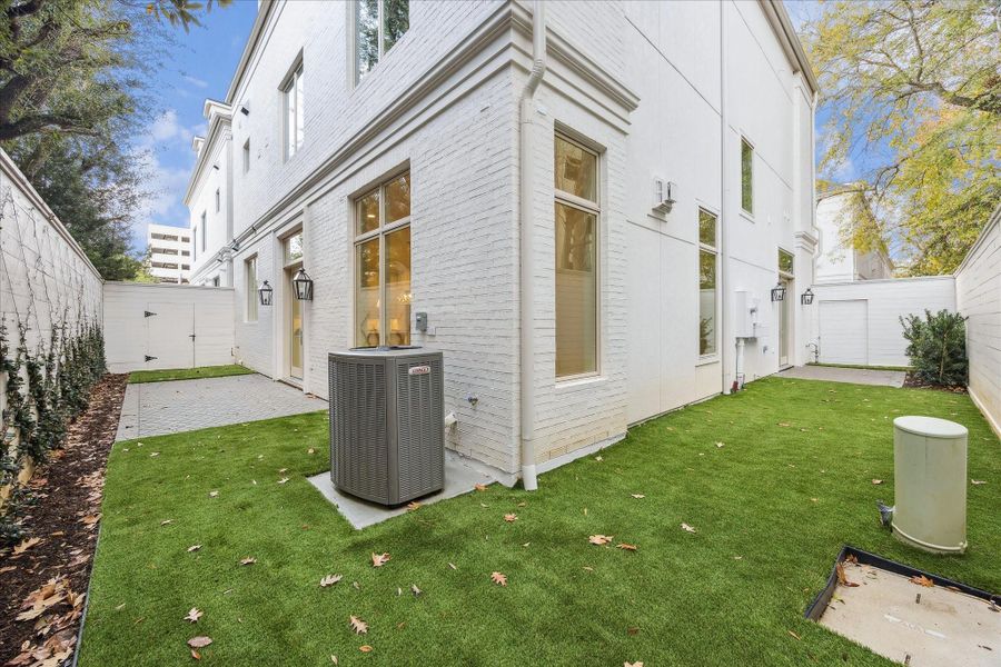 Rear patio is equipped with a gas stub. This tranquil outdoor area is a perfect extension of your living space. A 10-foot fence provides privacy while entertaining or enjoying the yard. Options for patio upgrades include brick pavers, artificial turf, landscaping, or trellis along the fence.