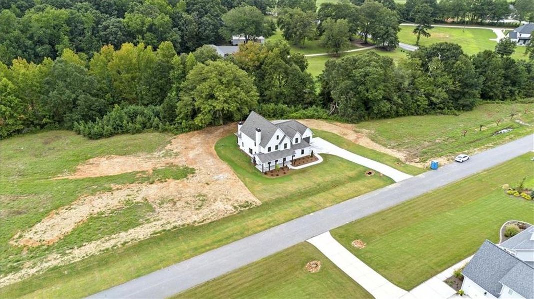 Exterior details and patio area of a home in Old Town Estates, Dacula (Image 38).