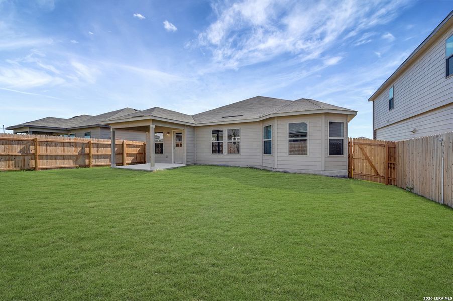 Exterior details and patio area of a home in Paloma Park, Converse (Image 27).