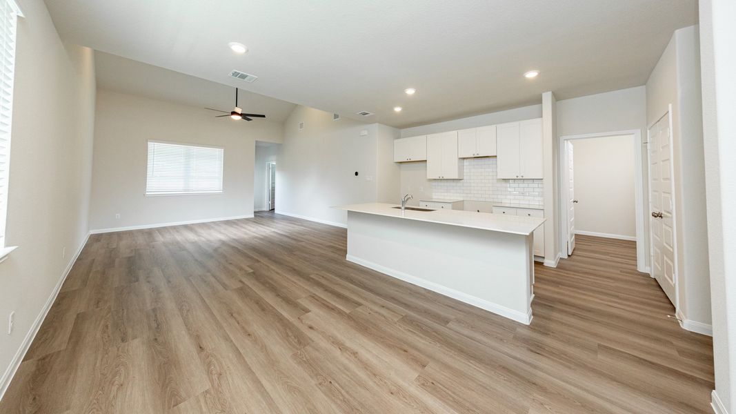 Kitchen to Dining Area and Family Room