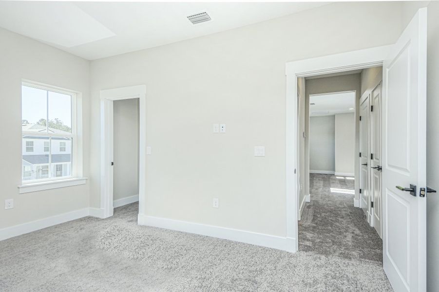 Representative unfurnished interior of a home built from the Julington by Riverside Homes in Hidden Creek at SilverLeaf 70' Series, St. Augustine (Image 39).