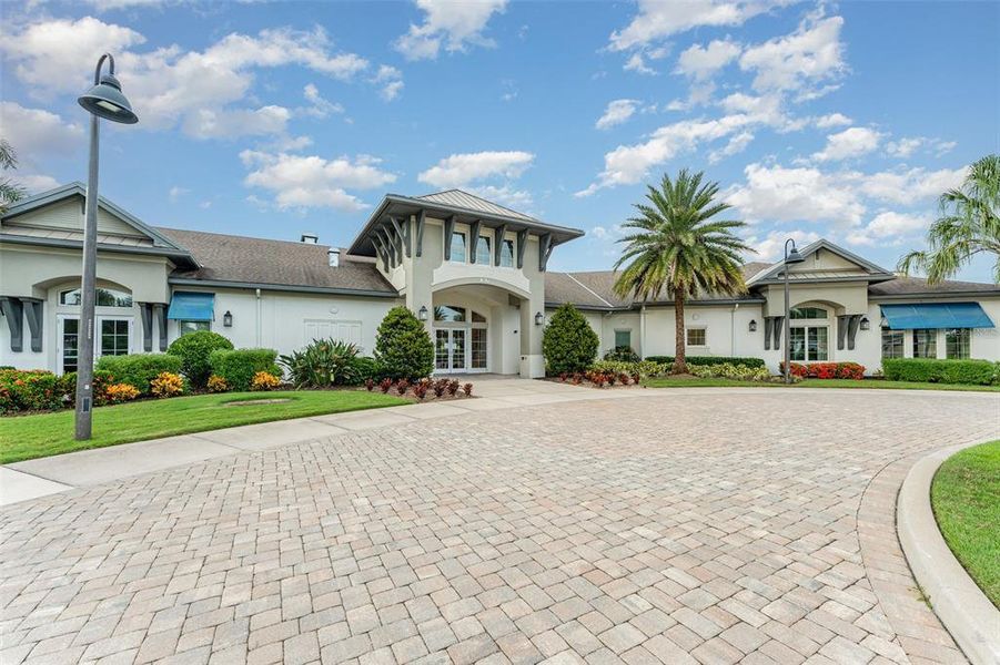 Front exterior of a new home in , Kissimmee, FL, highlighting curb appeal (Image 24).