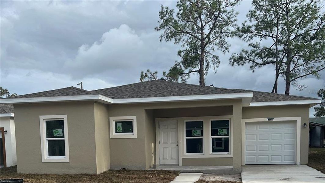 Front exterior of a new home in , Tampa, FL, highlighting curb appeal (Image 1). Front exterior of a new home in , Tampa, FL, highlighting curb appeal (Image 1).