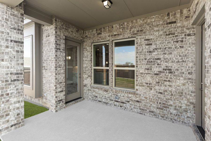 Exterior details and patio area of a home in Providence Cove, McKinney (Image 3). Exterior details and patio area of a home in Providence Cove, McKinney (Image 3).