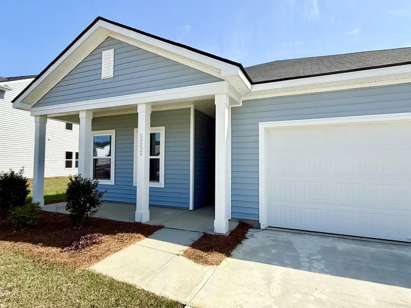 Exterior details and patio area of a home in , Summerville (Image 3).
