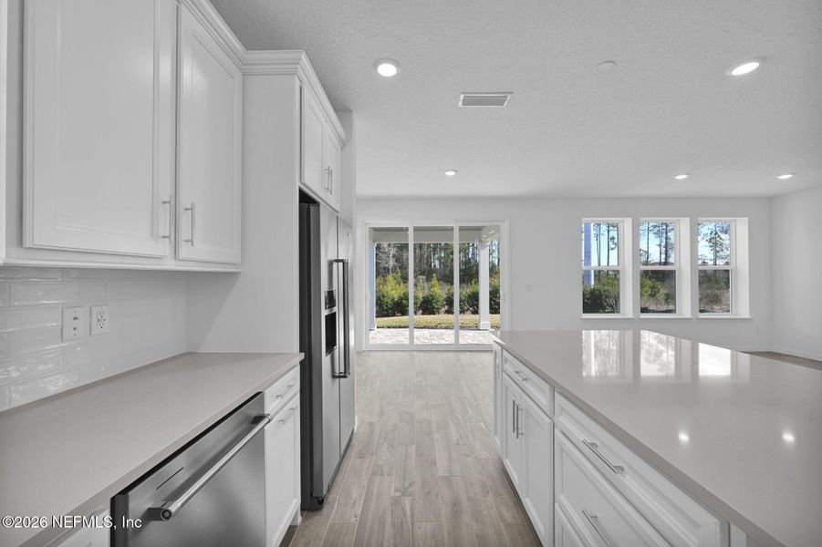 Furnished interior view inside a new home in Del Webb Wildlight, Yulee (Image 7).