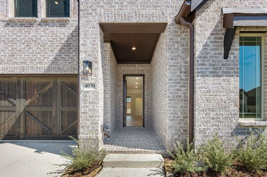 Exterior details and patio area of a home in Windsong Ranch Classic 61, Prosper (Image 20). Exterior details and patio area of a home in Windsong Ranch Classic 61, Prosper (Image 20).