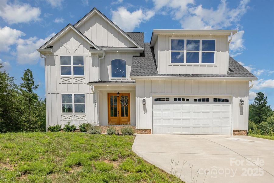 Front exterior of a new home in , Clover, SC, highlighting curb appeal (Image 21). Front exterior of a new home in , Clover, SC, highlighting curb appeal (Image 21).