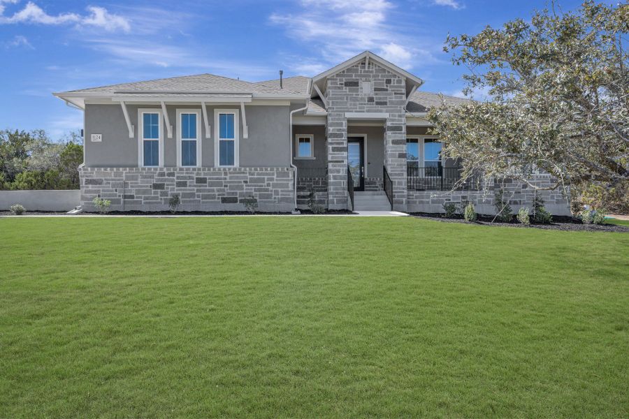 Front exterior of a new home in Thornebrook, Bulverde, TX, highlighting curb appeal (Image 18).