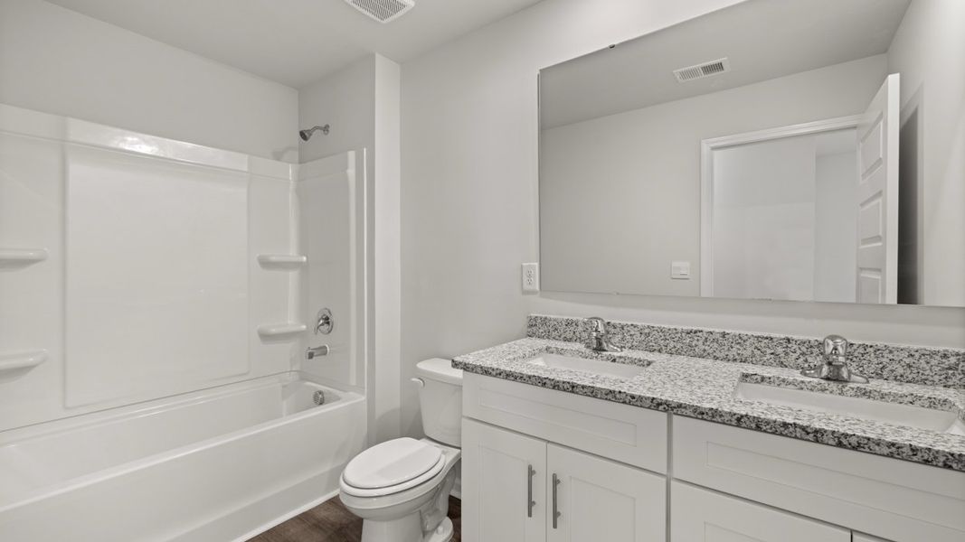 Furnished interior view inside a new home in Southwind Village, Evans (Image 10).