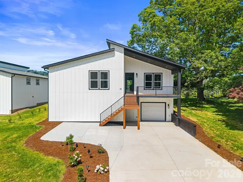 Exterior details and patio area of a home in , Hendersonville (Image 3).