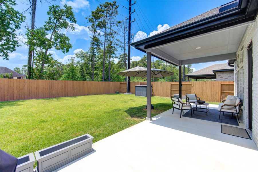 Enjoy the humongous back yard with high fences and no back neighbors!