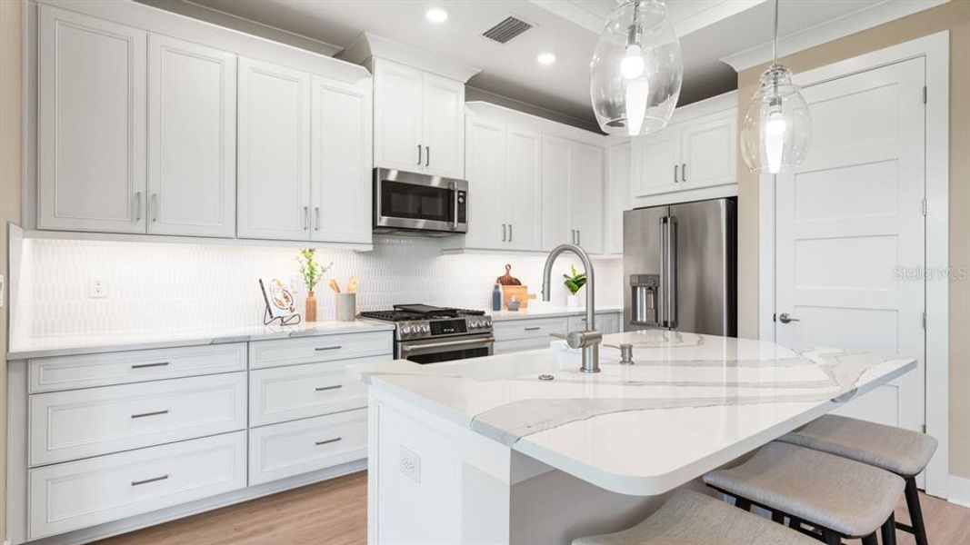 Furnished interior view inside a new home in Esplanade at Azario Lakewood Ranch, Lakewood Ranch (Image 16).