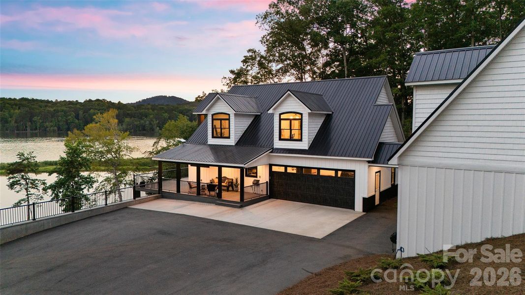 Front exterior of a new home in , Troy, NC, highlighting curb appeal (Image 24).