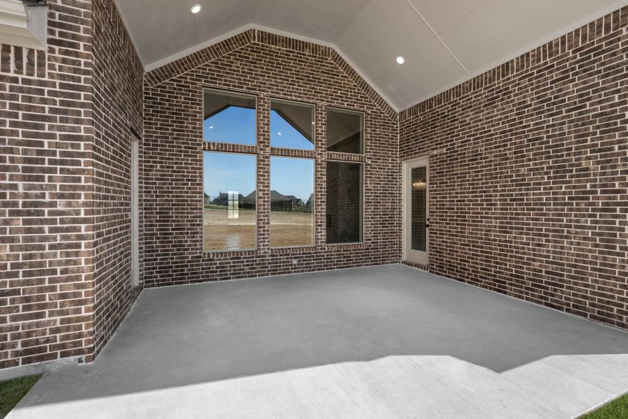Exterior details and patio area of a home in Paloma Ranch, Justin (Image 3).