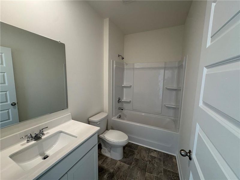 Furnished interior view inside a new home in Oakchase at Hampton, Hampton (Image 12).