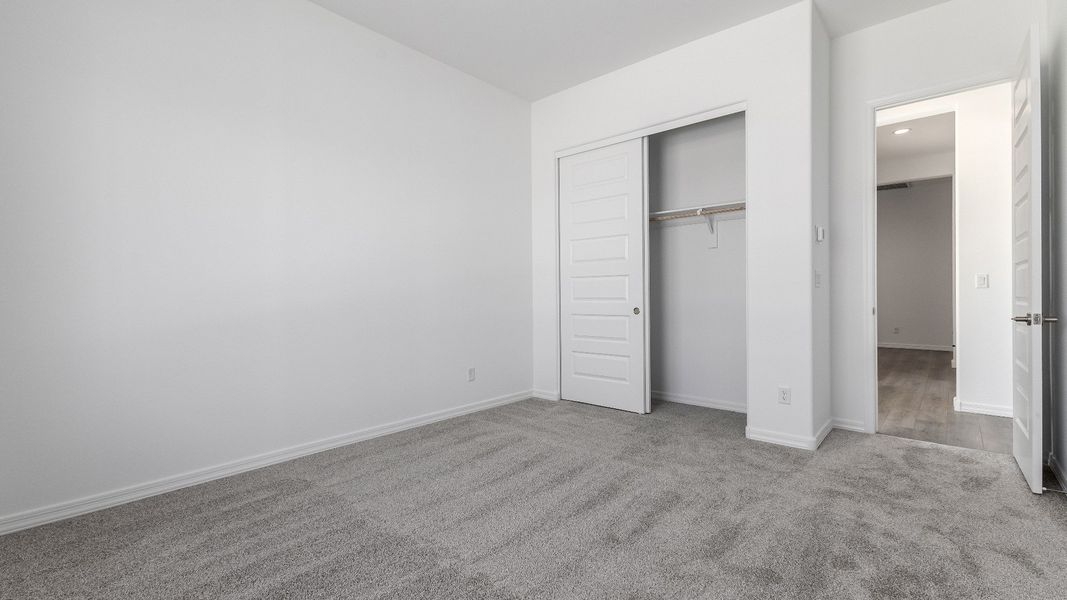 Representative furnished interior of a home built from the Granada by DRB Homes in Windrose, Waddell (Image 30).