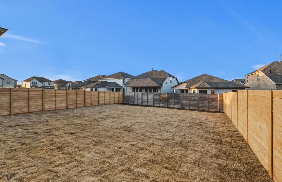 Exterior details and patio area of a home in Horizon Lake, Leander (Image 28).
